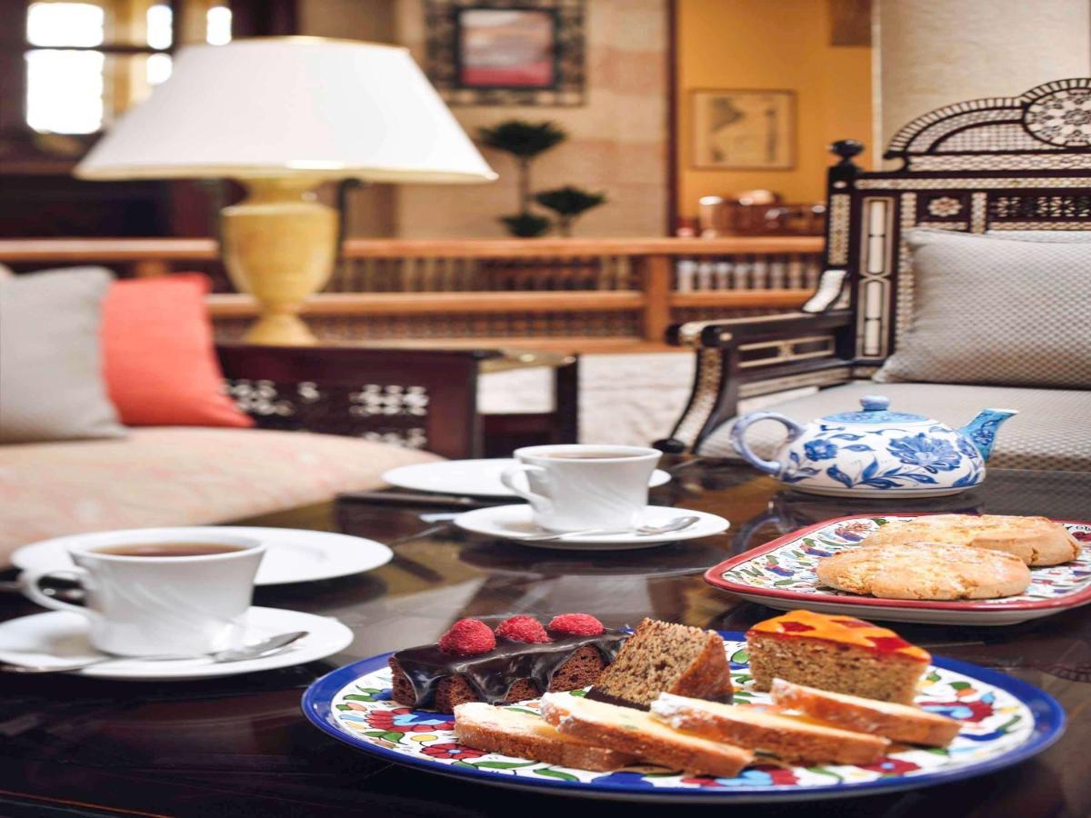 Moevenpick Resort Petra Ваді-Муса Екстер'єр фото Afternoon tea at the Taj Mahal Palace, Mumbai